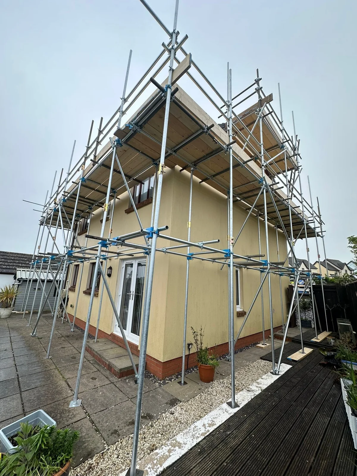 Rear scaffold working platforms around a residential property