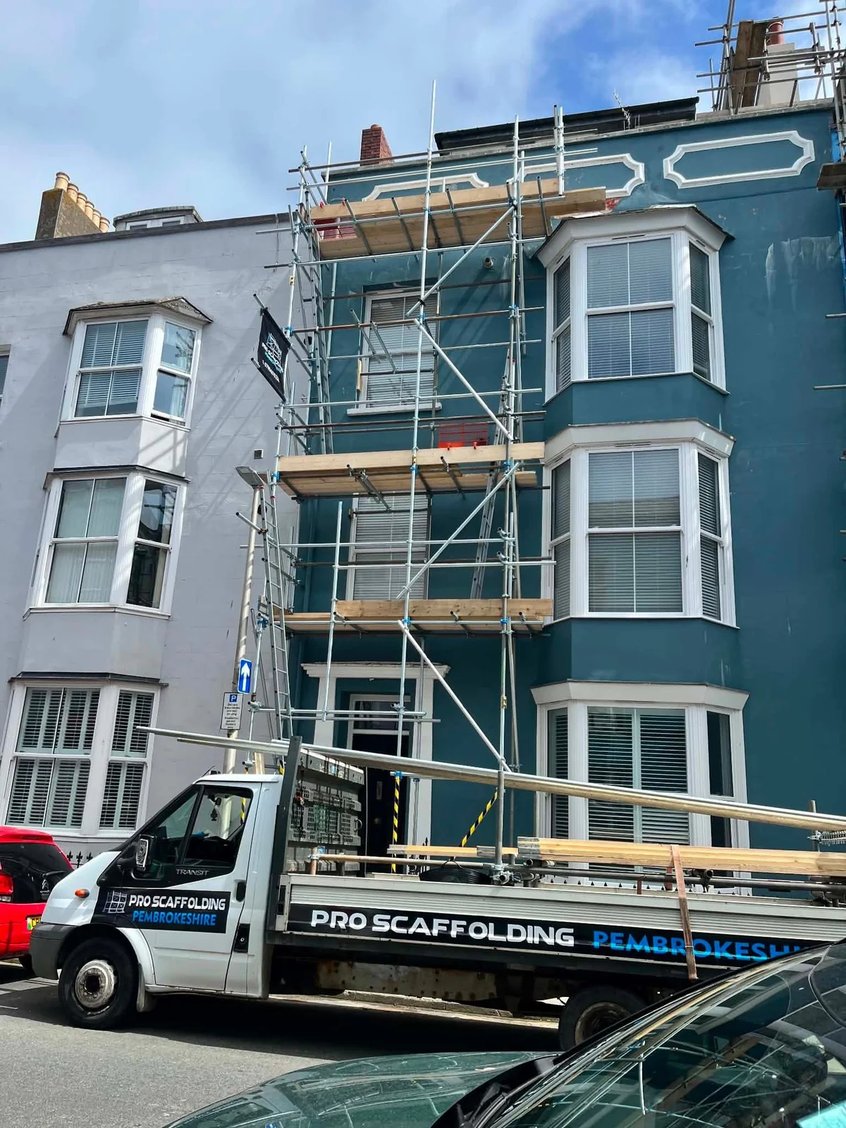 Scaffolding erected on the front of a multi-storey Tenby property